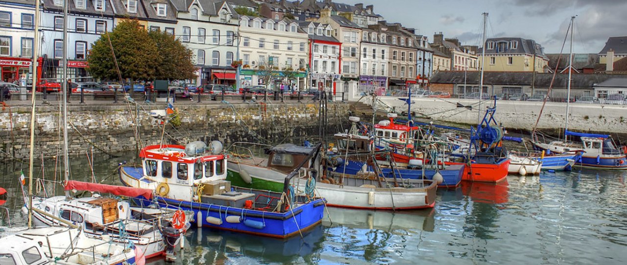 image of harbour with houses in background